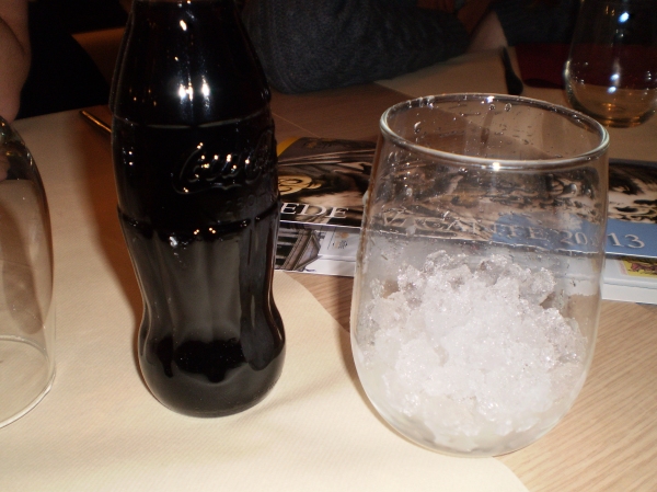 Yes, that is ice in my class next to the Coke bottle!  I was so shocked when I got ice in my glass from a seafood restaurant in Trastevere that I had to snap a pic.  Ice is not generally served at restaurants in Italy and much of Europe, sometimes drinks and water come cold and most of the time they don't, so this was a real treat!